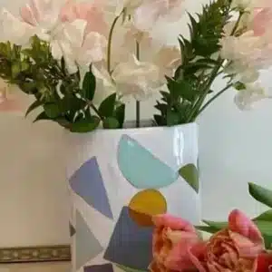 Oval vase decorated with colored geometric shapes