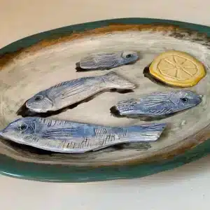 Plat décoratif en barbotine « poissons »